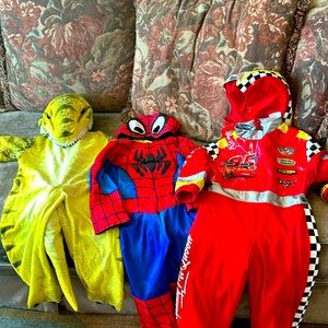 Lot of costumes—Lightening McQueen, Spiderman, T-Rex Dino